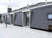 Terrasse mit Schieferfassade