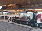 The platform is hoisted to the right place and placed in the hall