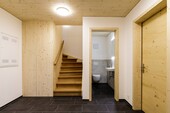 Les plafonds en bois massif créent une atmosphère agréable dans ce bâtiment de remplacement.