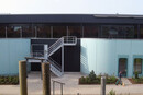 Addition of storey, extension Migros